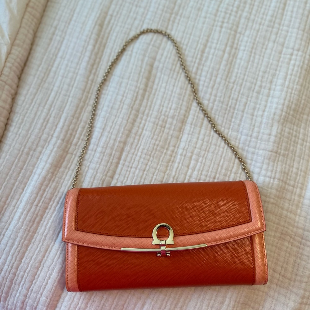SALVATORE FERRAGAMO Orange Leather Clutch with Gold Chain